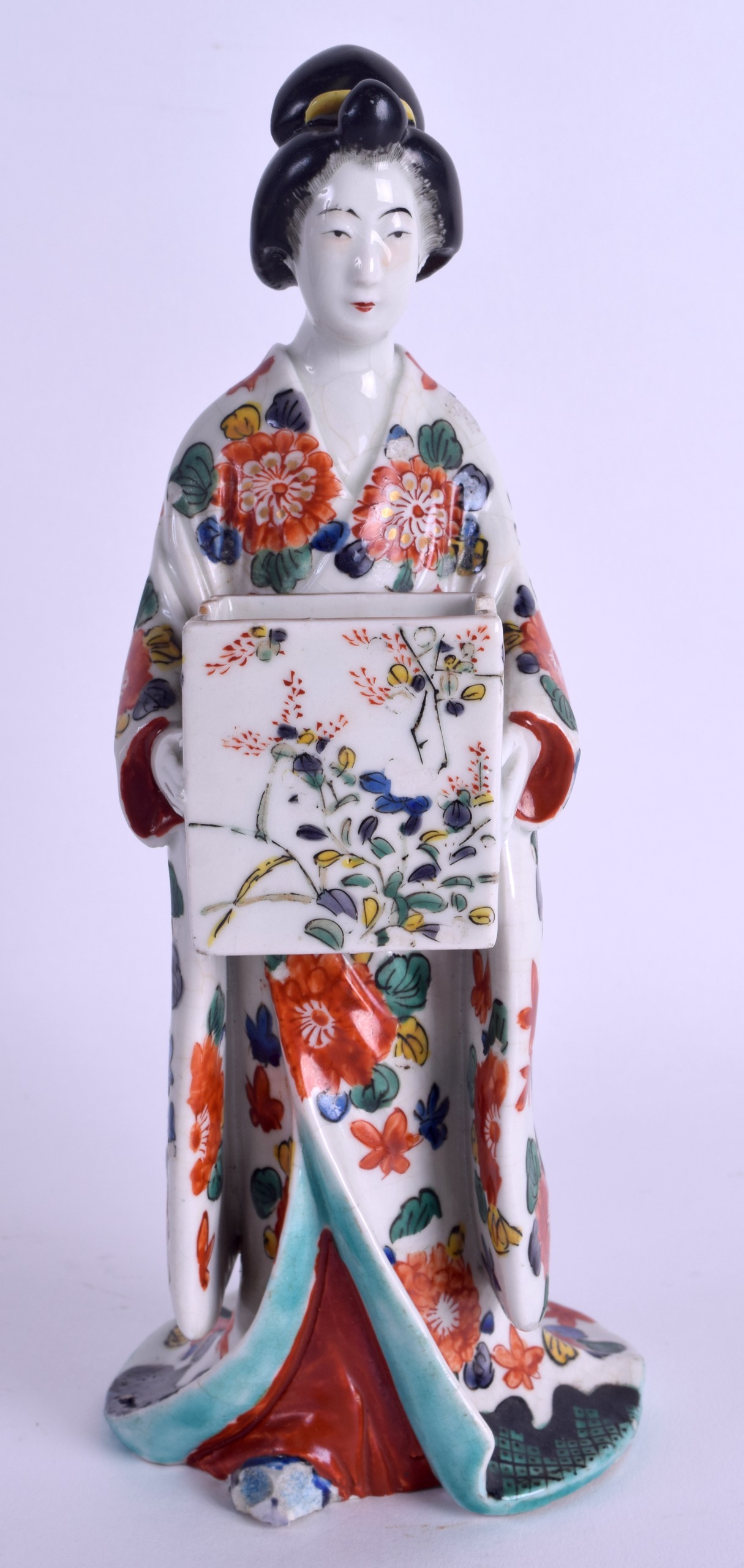 AN 18TH CENTURY JAPANESE EDO PERIOD IMARI KUTANI FIGURE OF A FEMALE C1720 painted with floral