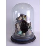 A LARGE VICTORIAN CRYSTAL GROTTO formed with numerous minerals upon an ebonised base. Grotto 34 cm x