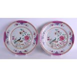 A PAIR OF EARLY 18TH CENTURY CHINESE FAMILLE ROSE EXPORT PLATES Qianlong, painted with birds amongst