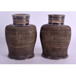 A VERY RARE PAIR OF 18TH CENTURY CHINESE SILVER AND SILVER WIRE TEA CANISTERS Qianlong, of highly