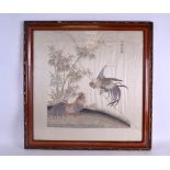 A LARGE PAIR OF EARLY 20TH CENTURY CHINESE SILKWORK PANELS depicting birds within landscapes under