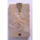 A 19TH CENTURY FRENCH PALAIS ROYALE CARVED MOTHER OF PEARL NOTE PAD with ivory fittings, carved with