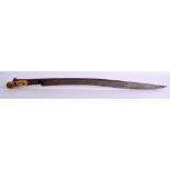 A GOOD MID 19TH CENTURY MIDDLE EASTERN CARVED IVORY AND STEEL SWORD with inscription to blade. 62 cm
