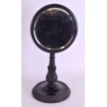 A GOOD WILLIAM IV EBONY GENTLEMANS SHAVING MIRROR finely carved with acanthus capped column and