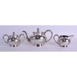 A LATE 19TH CENTURY CHINESE SILVER THREE PIECE TEASET by Kut Hing, decorated and engraved with birds