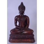 A LARGE CHINESE BRONZE BUDDHA, in the form of Shakyamuni, modelled seated upon a lotus base. 40 cm