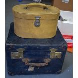 A VINTAGE TRAVELLING TRUNK OR CASE, together with a vanity case. Largest 28 cm x 39 cm.