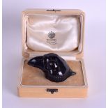 AN UNUSUAL RUSSIAN CARVED HARDSTONE FIGURE OF A STYLISED BIRD within a fitted box, inset with semi