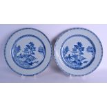 A LARGE PAIR OF EARLY 18TH CENTURY CHINESE BLUE AND WHITE PORCELAIN PLATES Yongzheng/Qianlong,