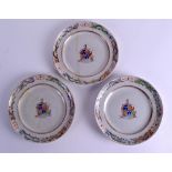 A RARE SET OF THREE 19TH CENTURY CHINESE ARMORIAL CANTON PLATES painted with dragons. 20 cm