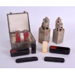 AN UNUSUAL PAIR OF LATE 19TH CENTURY HORN AND IVORY SEALS within sliding boxes, together with a pair