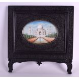 A LARGE 19TH CENTURY INDIAN PAINTED IVORY PORTRAIT MINIATURE depicting the Taj Mahal, within an