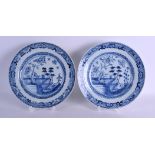 A PAIR OF 18TH CENTURY CHINESE BLUE AND WHITE PLATES Qianlong, painted with a zig zag fenced garden.