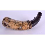 AN 18TH CENTURY CONTINENTAL ENGRAVED SCRIMSHAW POWDER HORN decorated with tribal like figures