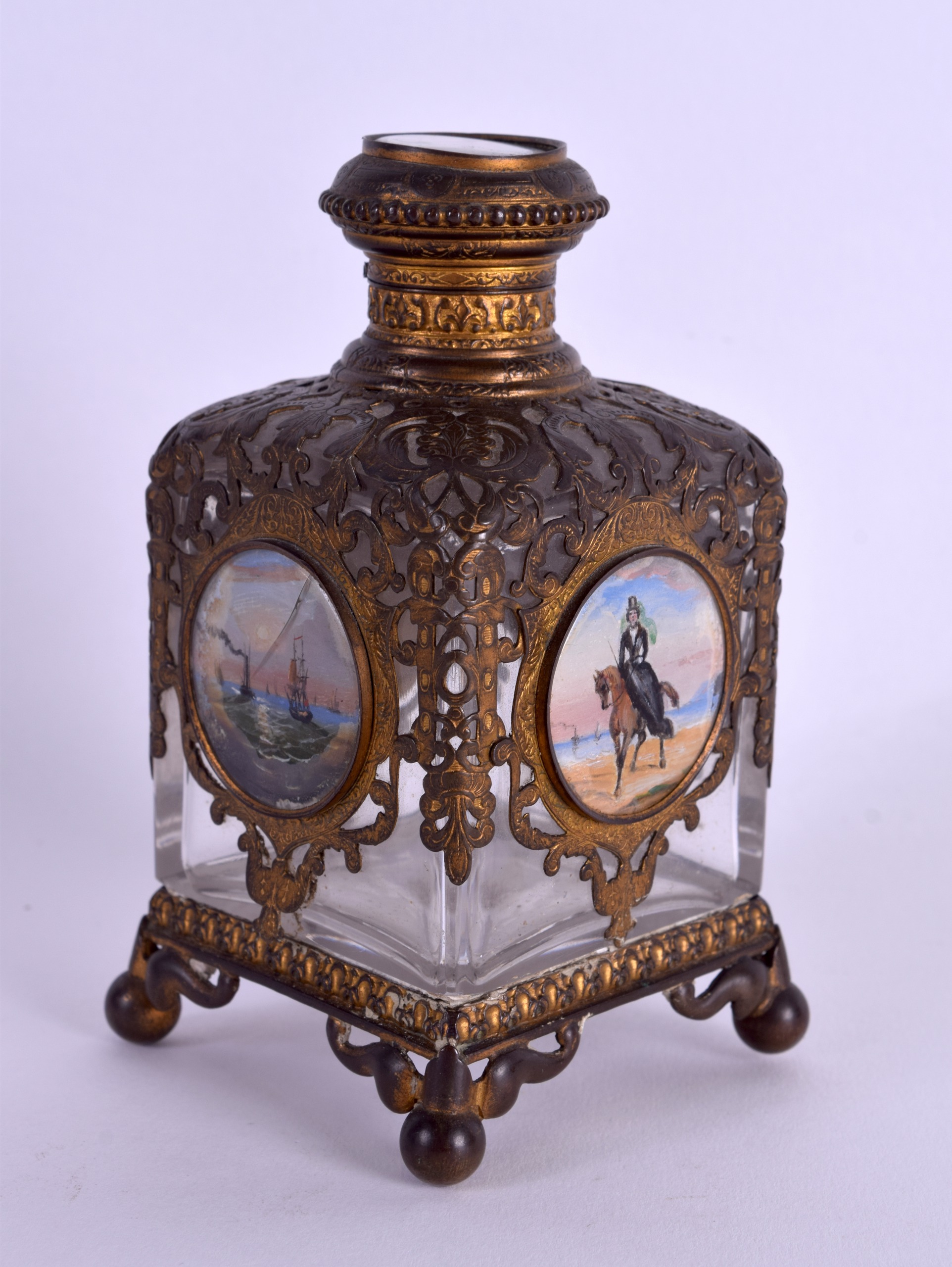 A 19TH CENTURY FRENCH GRAND TOUR BRASS OVERLAID SCENT BOTTLE decorated with figures and - Image 2 of 3