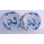 A PAIR OF EARLY 18TH CENTURY CHINESE BLUE AND WHITE PLATES Yongzheng/Qianlong, painted with a fenced