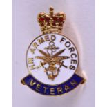 AN ARMED FORCES ENAMELLED VETERAN BADGE.