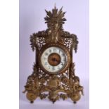 A LATE 19TH CENTURY FRENCH GILT BRASS STRUT MANTEL CLOCK with open work decoration and vines. 38