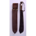 A WWI MILITARY BUTCHERS KNIFE within original leather case. Knife 51 cm long.
