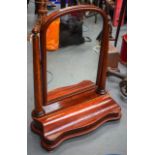 A HUGE MAHOGANY HALL MIRROR, with flap revealing compartment. 94 cm x 68 cm.
