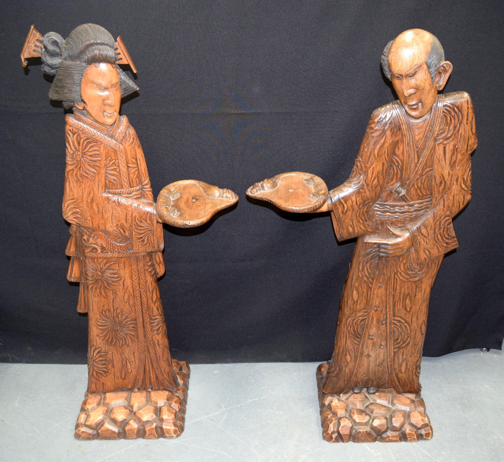 AN UNUSUAL PAIR OF FRENCH AESTHETIC MOVEMENT JAPANESQUE WOODEN DISPLAY STANDS formed as a male and