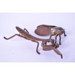 A BRONZE FIGURE OF A PRAYING MANTIS, together with a fly. 8.5 cm and 4.7 cm.