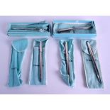 FIVE BOXED TIFFANY & CO SILVER PENS AND PENCILS. (5)