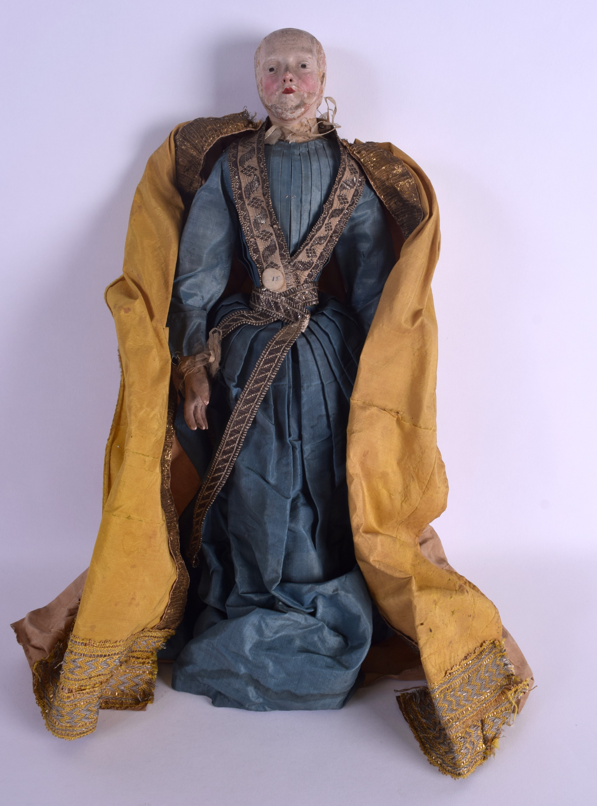 A FINE AND RARE MID 18TH CENTURY EUROPEAN WOODEN DOLL modelled in original clothing, the male with