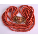 AN 18CT GOLD AND RED CORAL NECKLACE with coral inset clasp. 153 grams. 45 cm long.