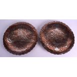 A PAIR OF 19TH CENTURY MIDDLE EASTERN SILVER INLAID BRONZE DISHES decorated with scripture,