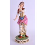 AN EARLY 19TH CENTURY DERBY FIGURE OF A DANCING GIRL modelled upon an open work base. 26 cm high.