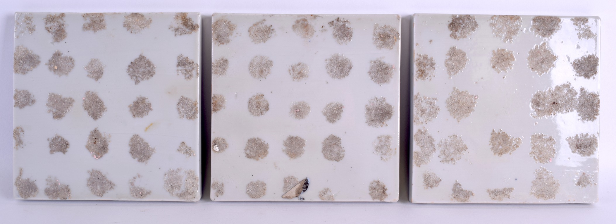 A SET OF THREE 19TH CENTURY JAPANESE BLUE AND WHITE TILES painted with game birds within landscapes. - Image 4 of 4