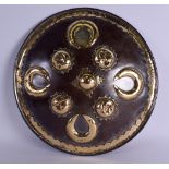 AN 18TH CENTURY MIDDLE EASTERN STEEL AND BRASS TARGE SHIELD possibly Ottoman, decorated with