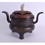 A 17TH/18TH CENTURY CHINESE TWIN HANDLED BRONZE CENSER AND COVER with white jade finial, decorated