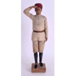 A LATE 19TH CENTURY INDIAN BOMBAY COMPANY SCHOOL TERRACOTTA SOLIDER modelled upon a square form