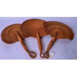 THREE VINTAGE HAND FANS, formed with wicker type surface. Largest 30 cm wide.