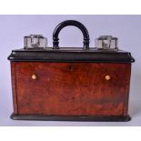 AN ANTIQUE WALNUT TRAVELLING STATIONARY BOX WITH INKWELL AND PEN TRAY, opening to reveal letter or