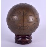 AN UNUSUAL 19TH CENTURY MIDDLE EASTERN ISLAMIC BRONZE GLOBE decorated with various scripture and