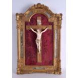 A LARGE 18TH/19TH CENTURY CONTINENTAL CARVED IVORY CRUCIFIX modelled upon a cross within a glass and