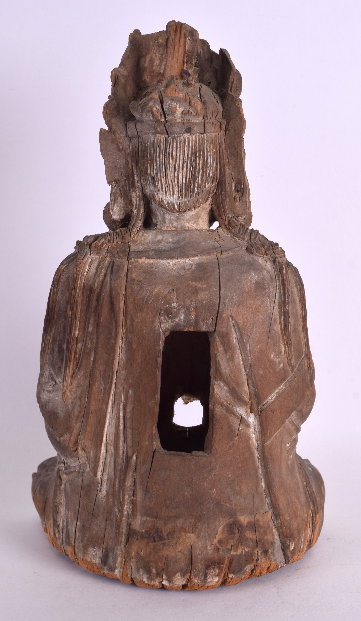 A CHINESE YUAN/MING DYNASTY CARVED WOOD FIGURE OF A SEATED BUDDHA elegantly modelled with an arm - Image 2 of 3