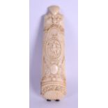 A FINE LATE 18TH CENTURY CARVED IVORY RASP with unusual box feature, decorated with mask heads and