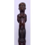 AN EARLY 20TH CENTURY AFRICAN TRIBAL CARVED WOOD STAFF modelled as a female with breasts exposed