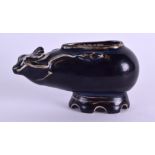 A RARE 19TH CENTURY CHINESE AUBERGINE GLAZED BRUSH WASHER of naturalistic form. 10.5 cm x 6.5 cm.