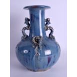 AN EARLY 20TH CENTURY CHINESE FLAMBE GLAZED ROBINS EGG BULBOUS VASE Qing, overlaid with roaming