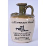 A VINTAGE TULLAMORE DEW BLENDED WHISKY STONEWARE JUG, "Uisge Baugh", "a product of Ireland". 19 cm