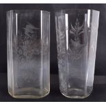 TWO LIMITED EDITION ETCHED GLASS VASES decorated with birds and foliage. 27 cm & 26 cm high. (2)