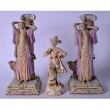 A LARGE PAIR OF CONTINTENTAL PORCELAIN CANDLESTICK HOLDERS, in the form of a female beside a column,