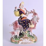 AN 18TH CENTURY DERBY FIGURE OF THE WELSH TAILORS COMPANION modelled riding upon a goat. 15 cm