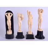 A GOOD SET OF FOUR EARLY 20TH CENTURY EUROPEAN CARVED IVORY FIGURES C1910 modelled as nude females