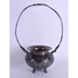 A RARE 19TH CENTURY JAPANESE MEIJI PERIOD SILVER SWING HANDLED BASKET imitating bamboo, presented by